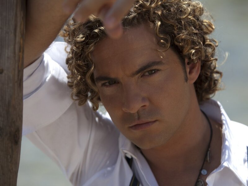 Man with Curly Hair — White, Serious