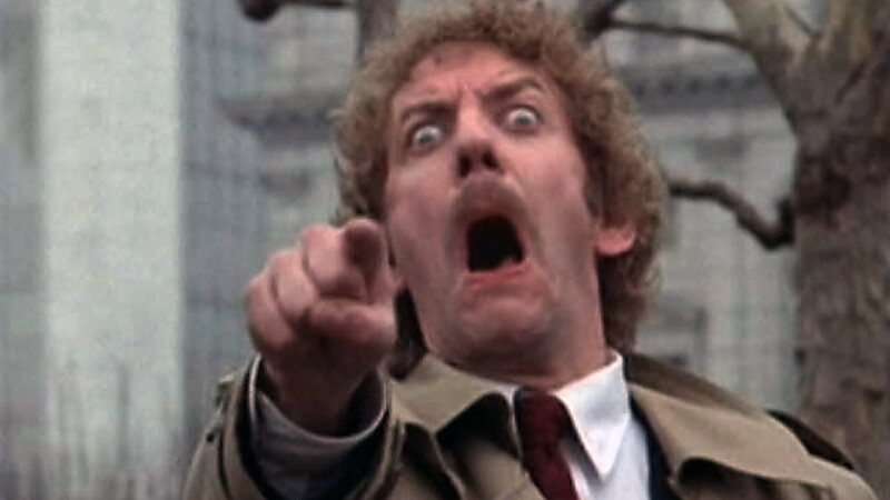 Man with Curly Hair Yelling