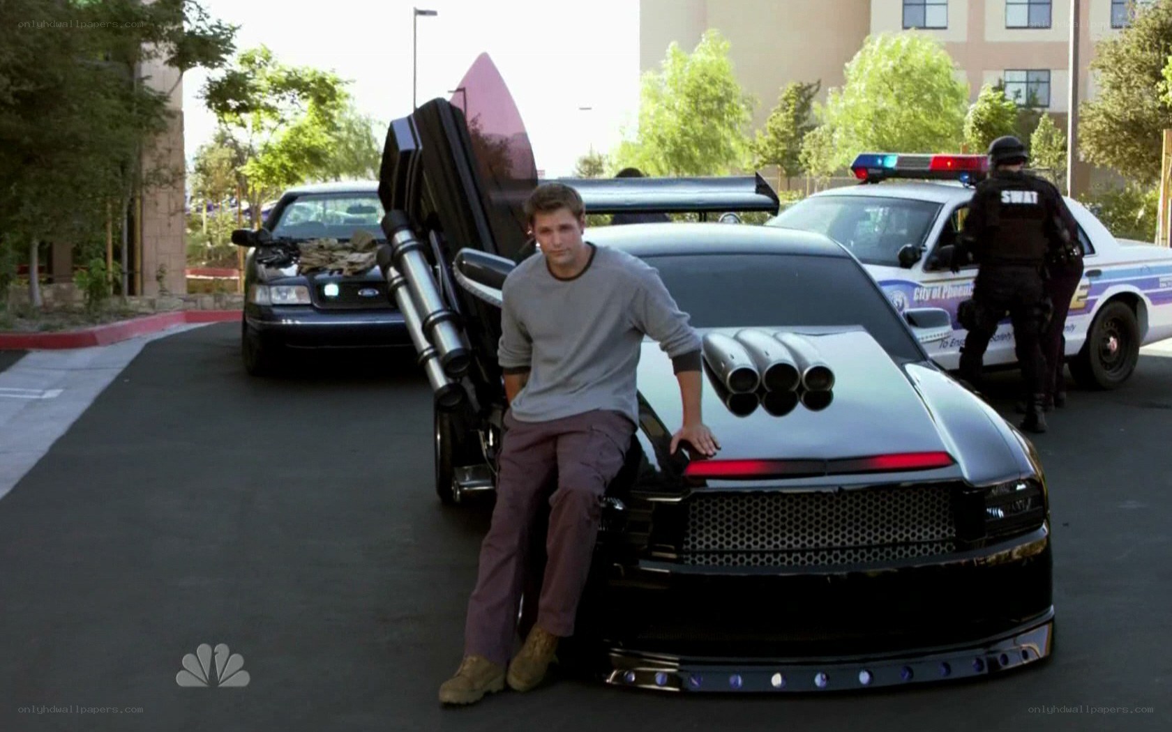 man with custom car and police