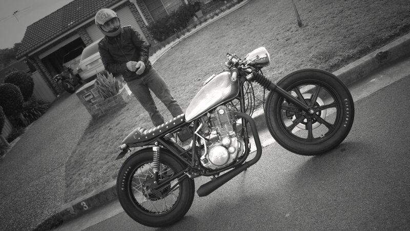 Man with custom motorcycle