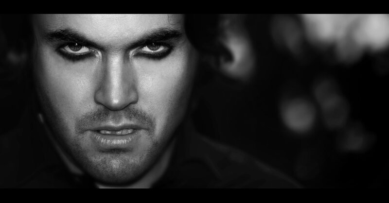 man with dark eye makeup