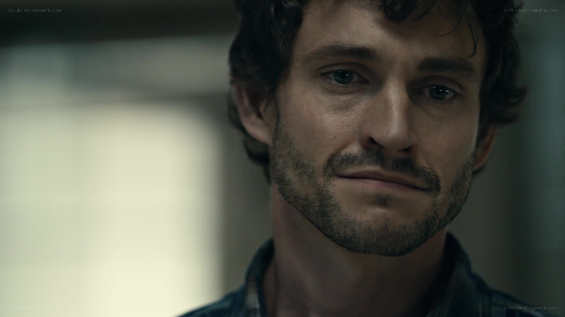 man with dark hair and beard