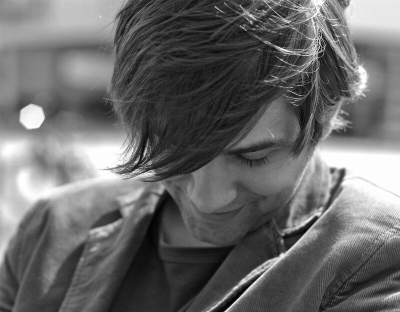 Man with Dark Hair — Black, Contemplative