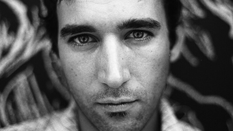 Man with Dark Hair — Black, Intense, Photograph