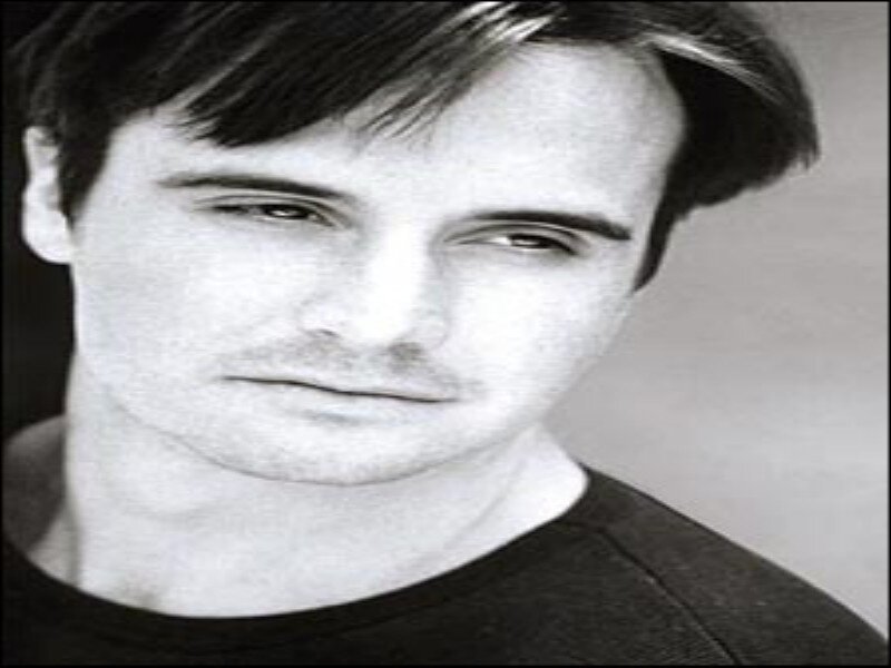 Man with Dark Hair — Black, Neutral, Photograph, Black Shirt