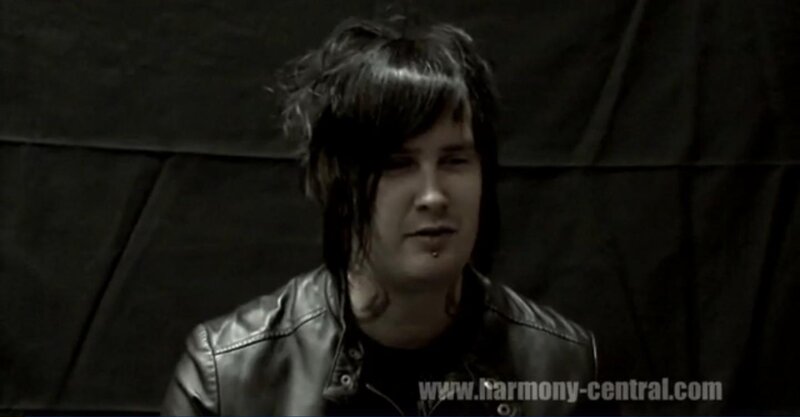 Man with Dark Hair — Black, Serious, Photograph, Leather Jacket, Lip Piercing