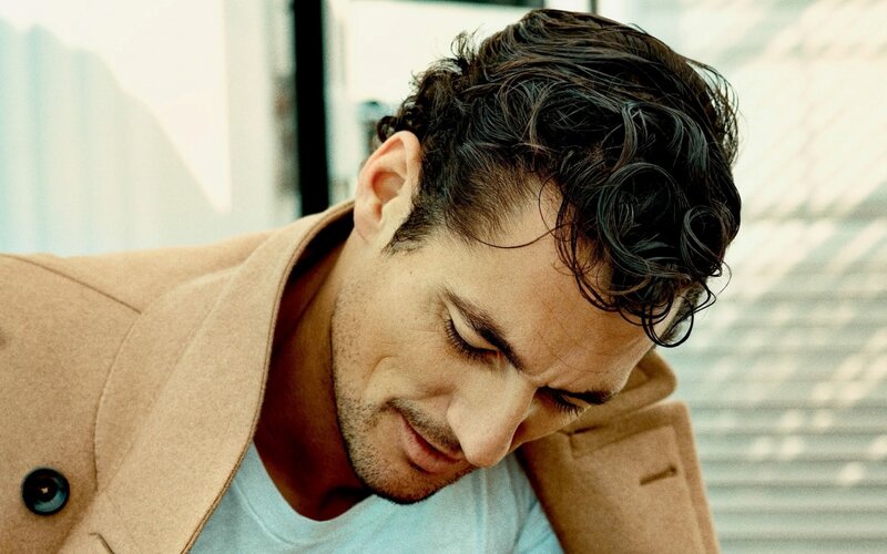 Man with Dark Hair — Brown, Contemplative, Photograph