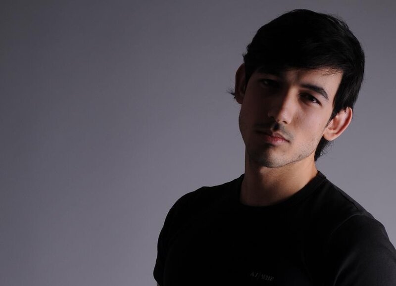 Man with Dark Hair — Gray, Dramatic, Photograph, Black T-shirt