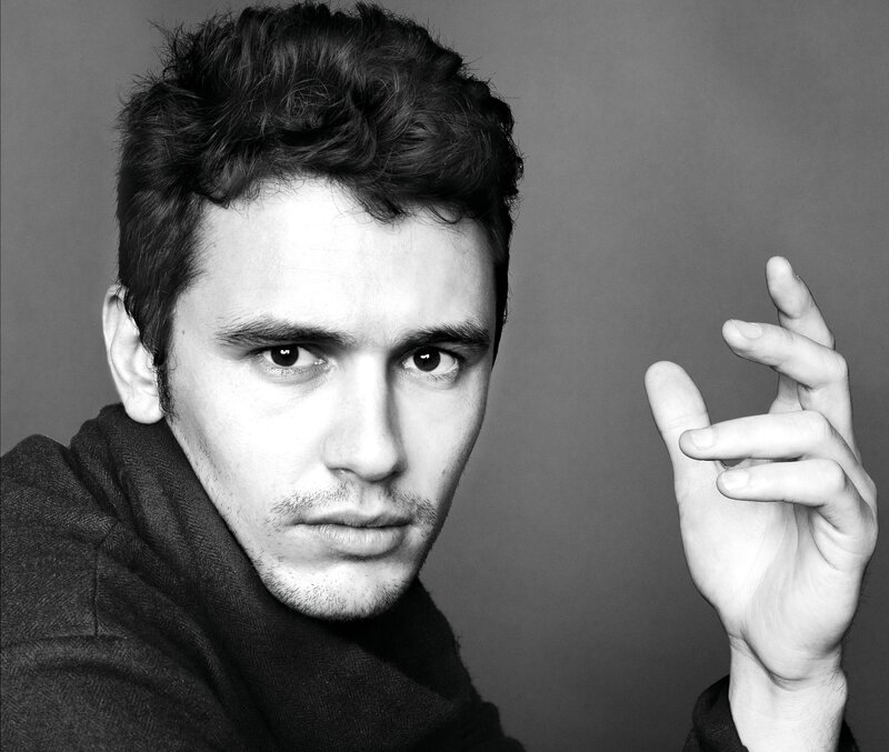 man with dark hair in black and white