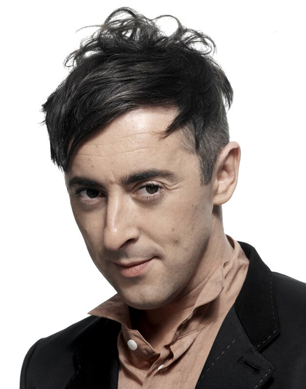 man with dark hair in suit