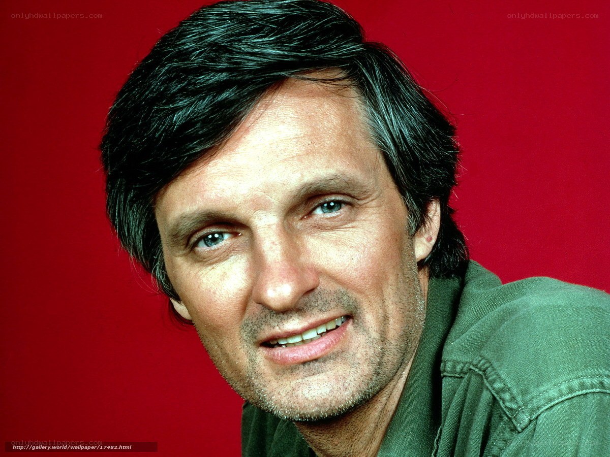 man with dark hair smiling