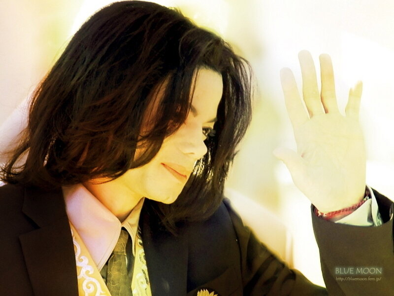 Man with Dark Hair Waving