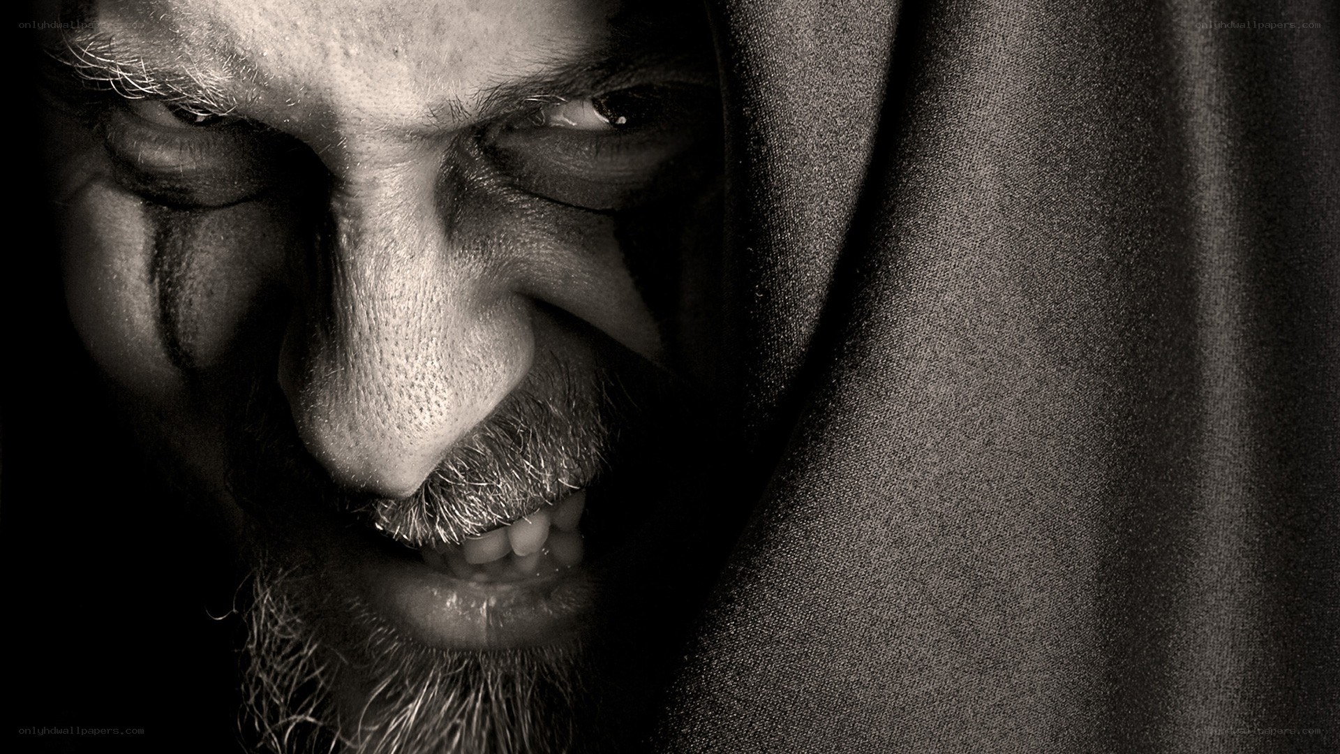 man with dark hood
