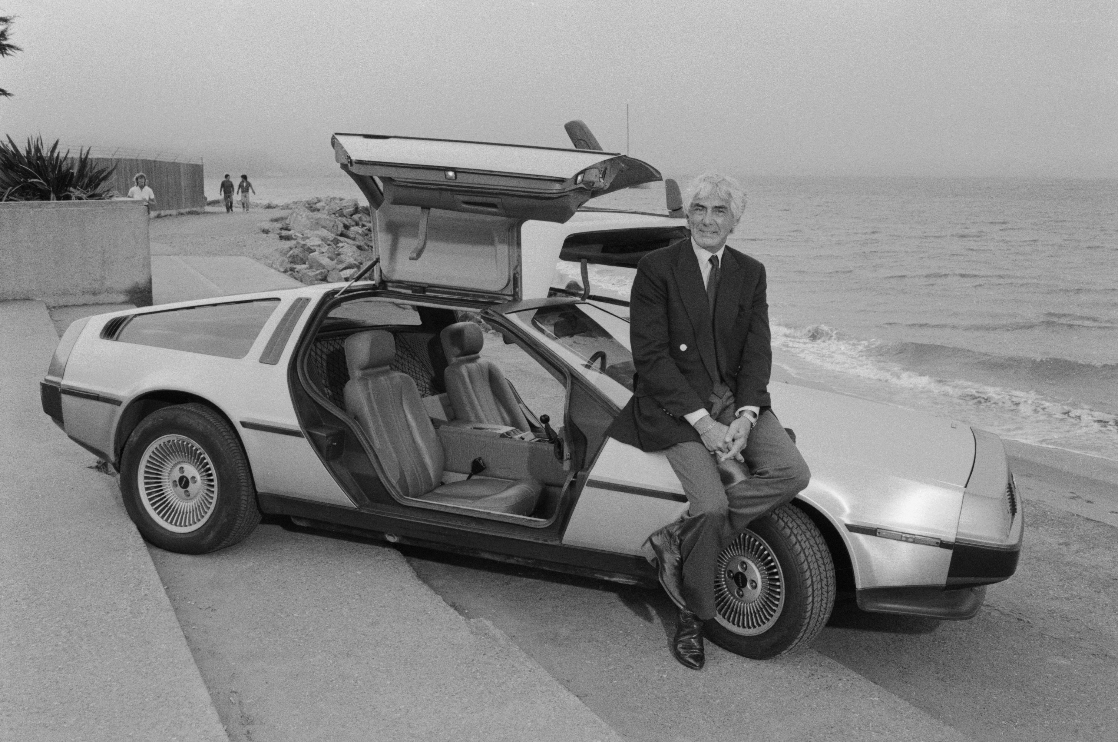 Man with DeLorean car