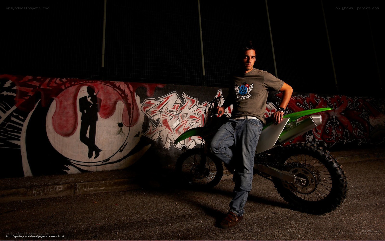 man with dirt bike at night