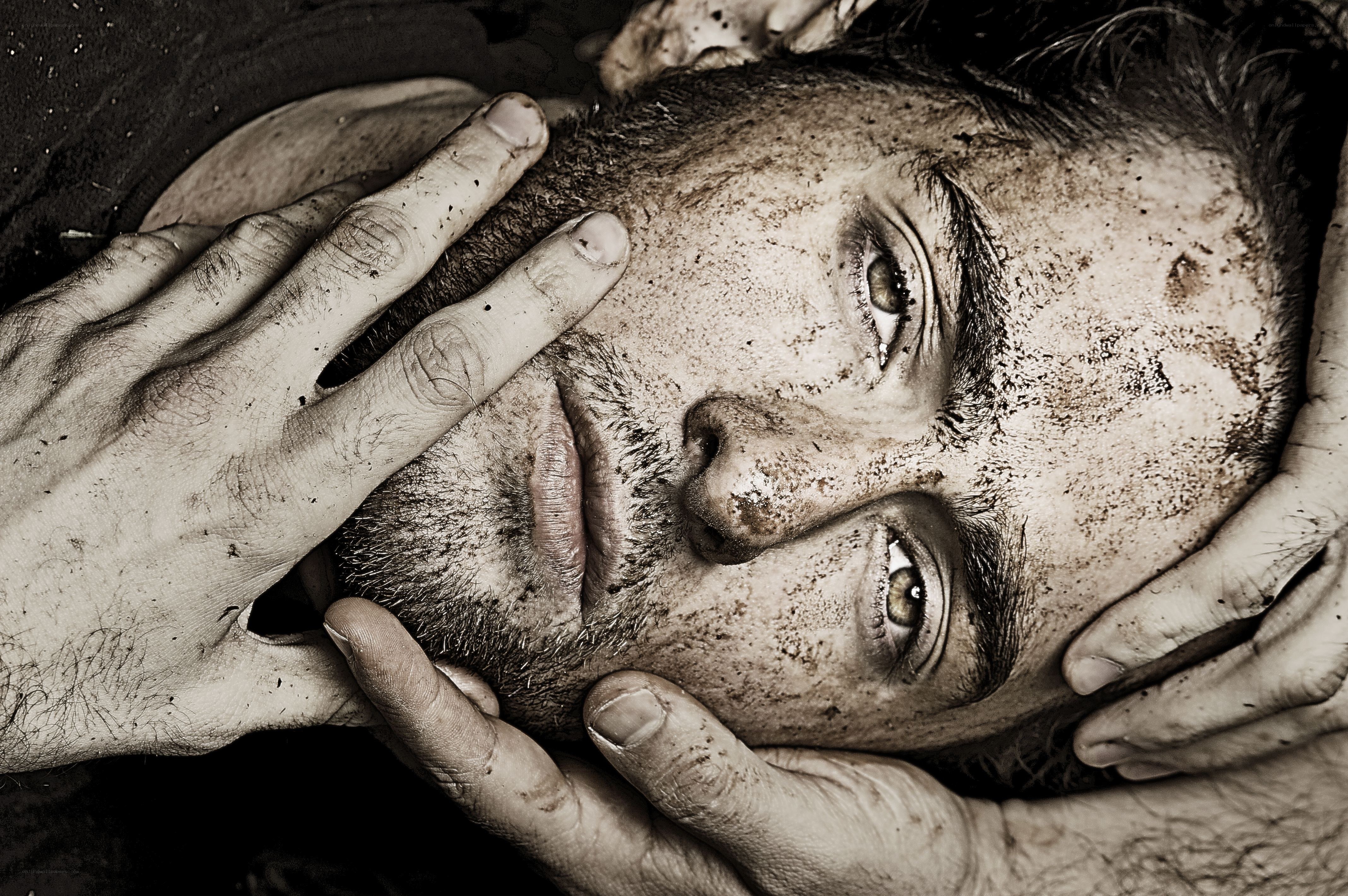 man with dirt on face