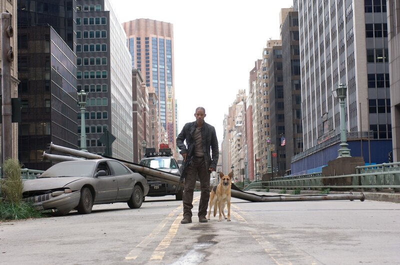 man with dog in city street