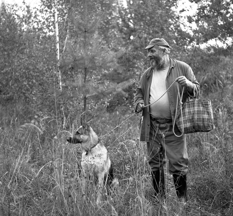 Man with Dog in Field
