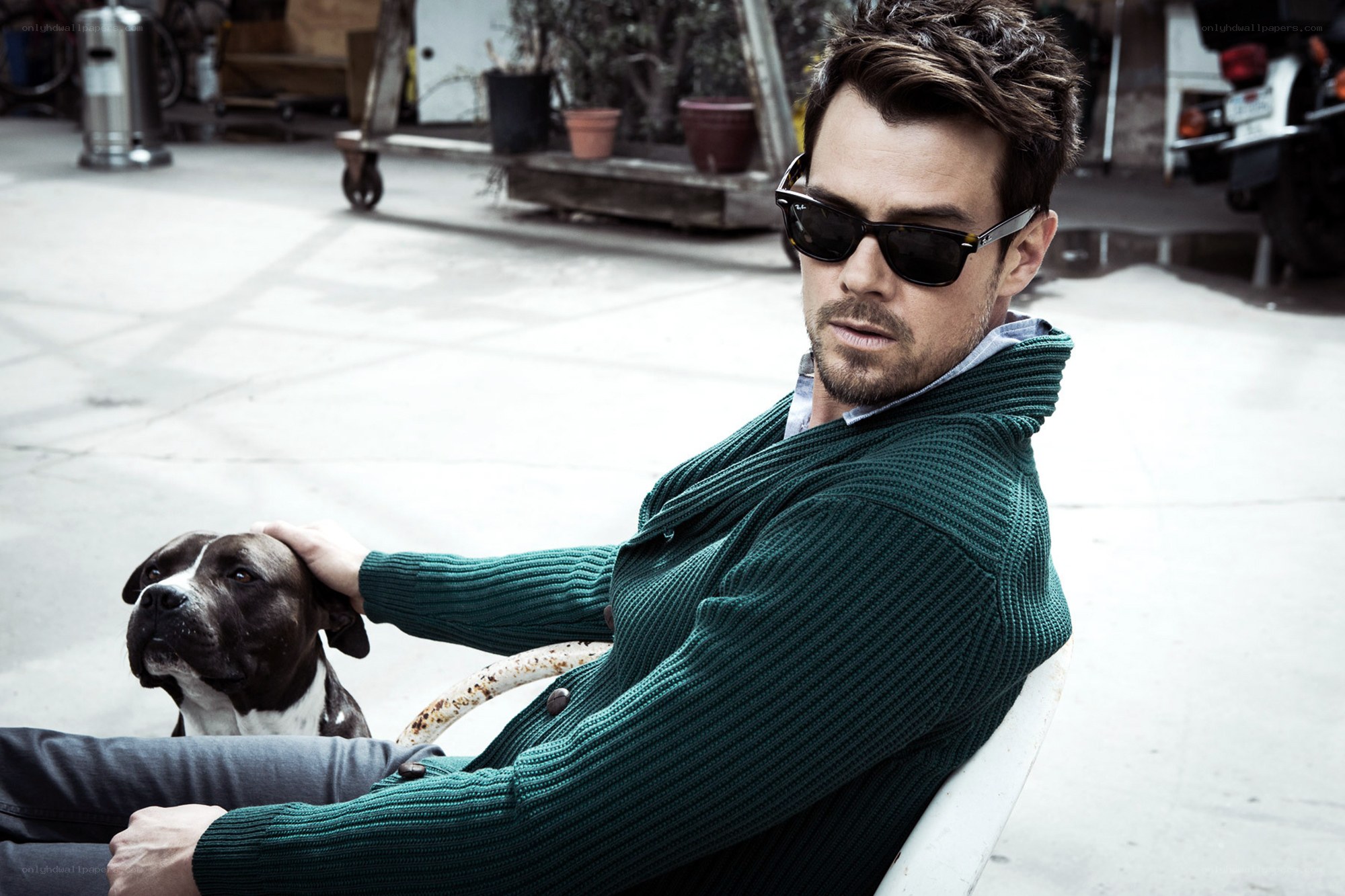 man with dog in urban setting
