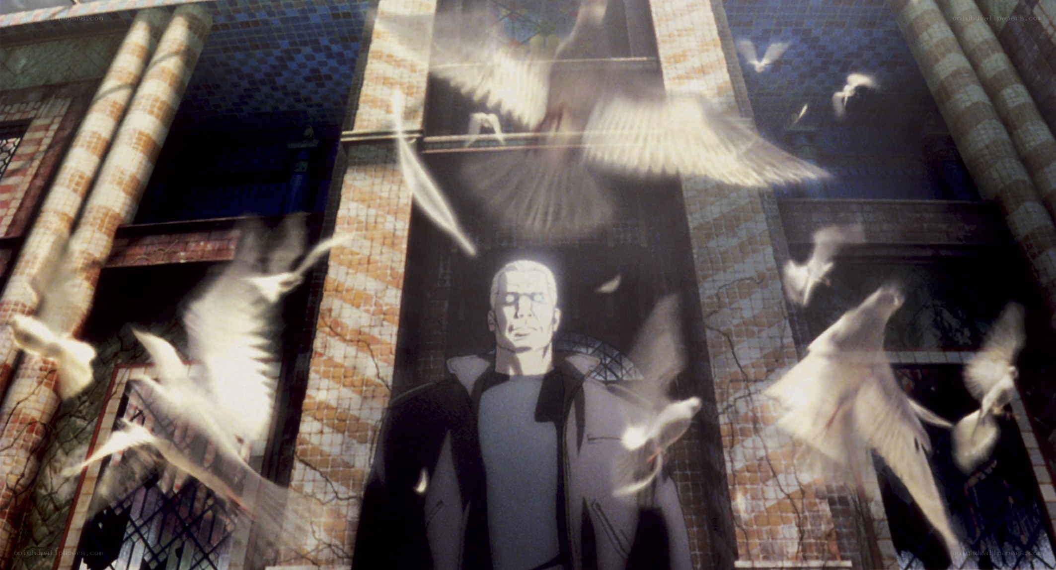 Man with doves in a tiled hall