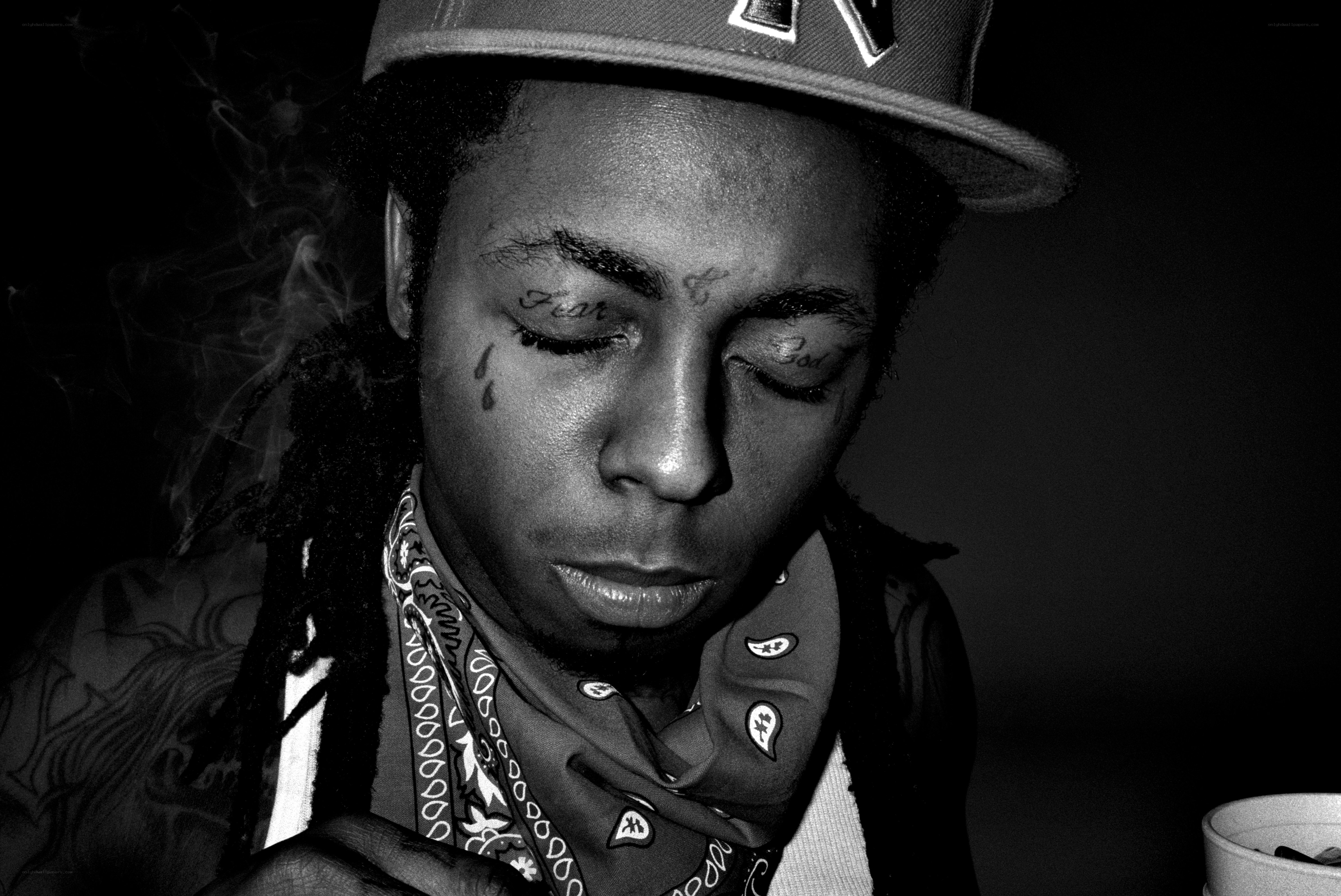 man with dreadlocks and bandana