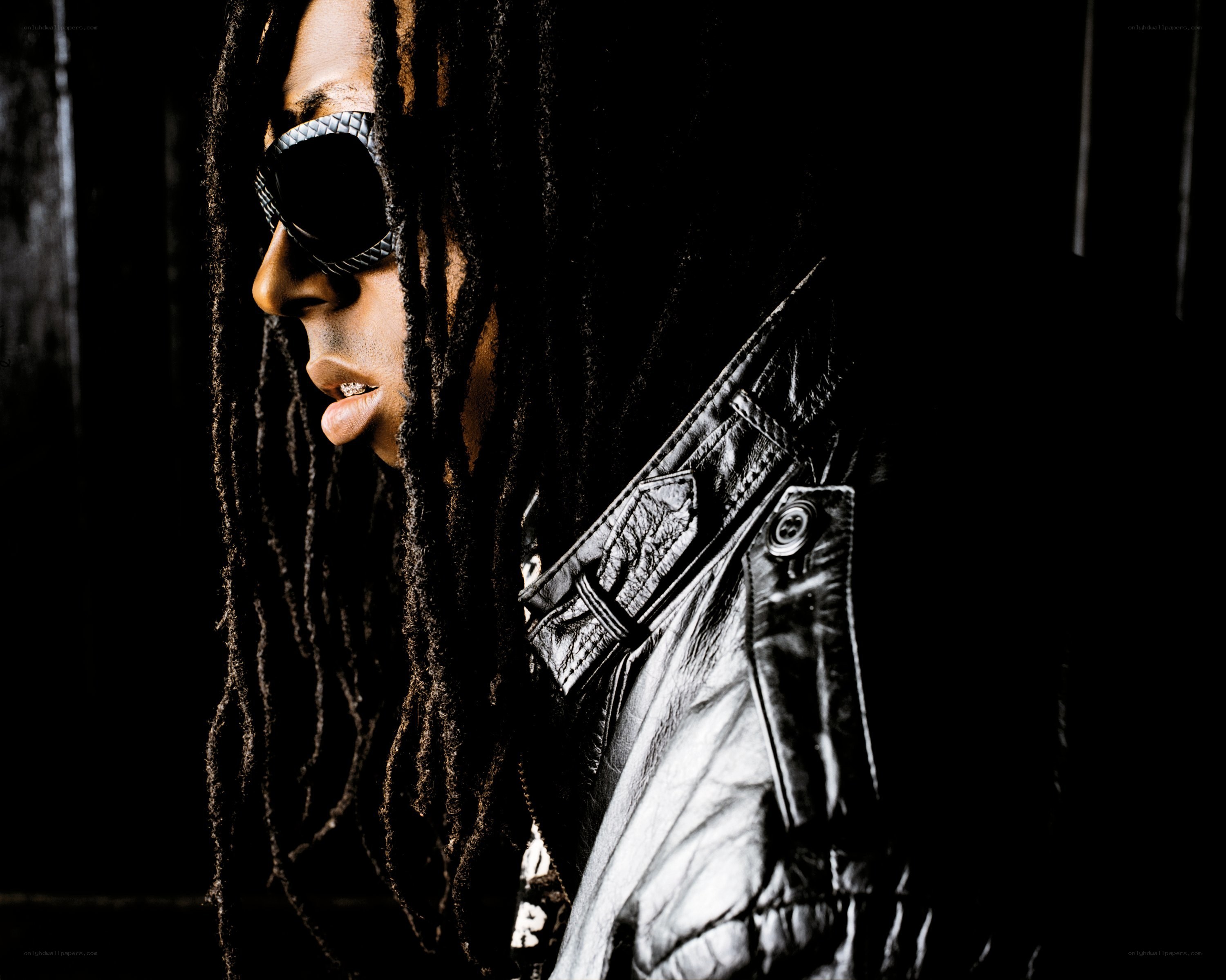 man with dreadlocks and sunglasses