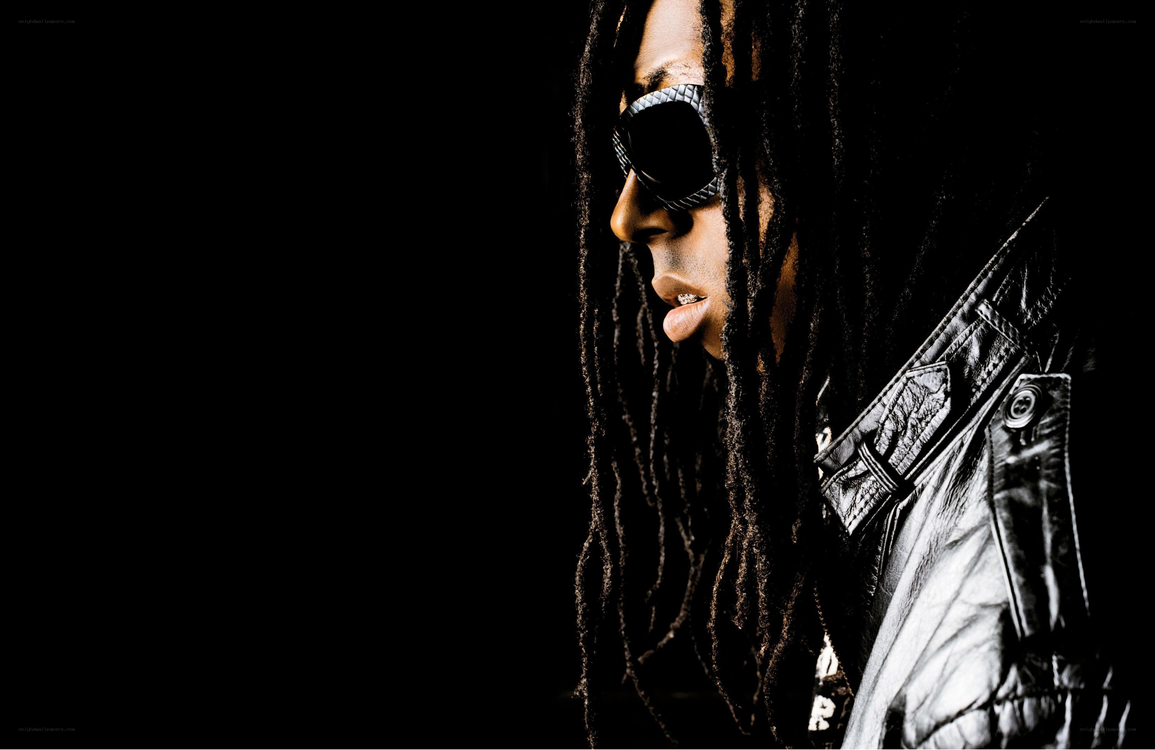 man with dreadlocks and sunglasses