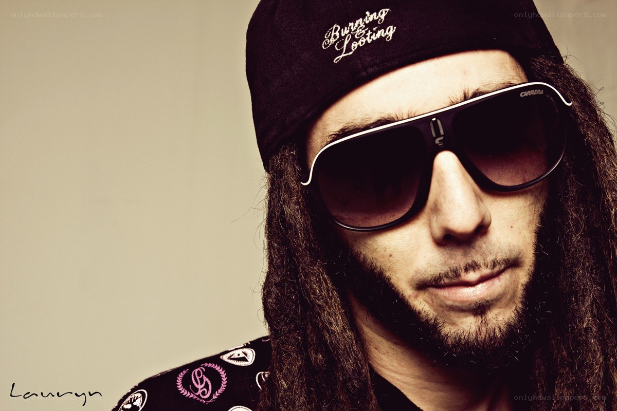 man with dreadlocks and sunglasses