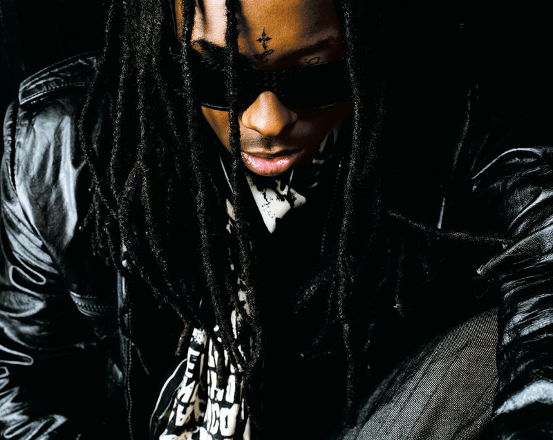 man with dreadlocks and sunglasses