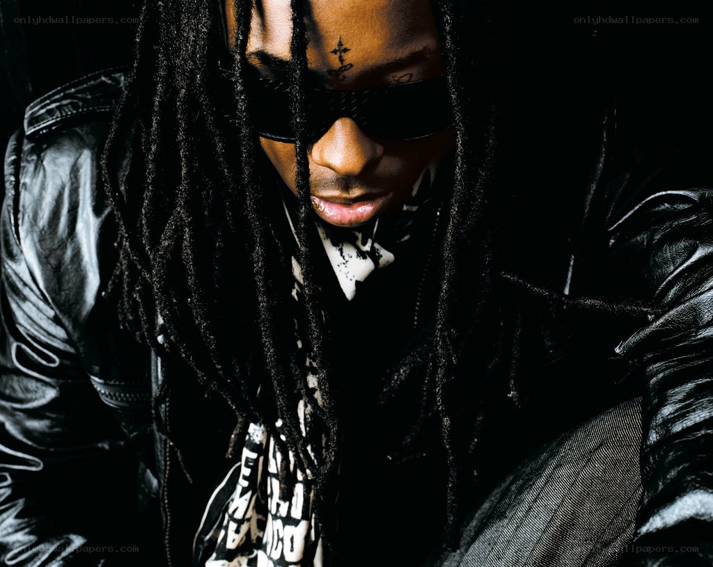 man with dreadlocks and sunglasses