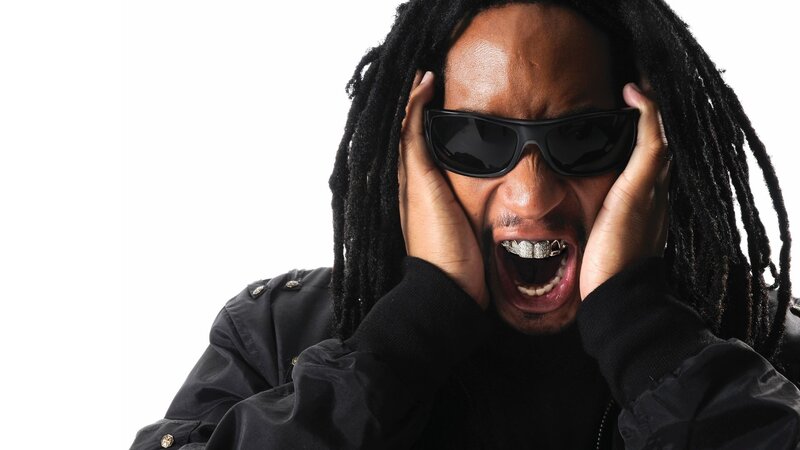 man with dreadlocks and sunglasses