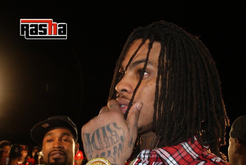 man with dreadlocks at event