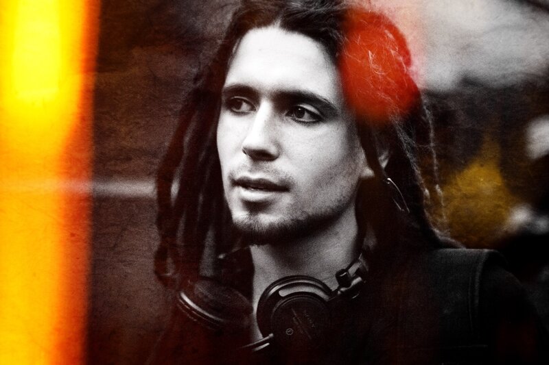 Man with Dreadlocks — Black, Serious, Photograph, Headphones