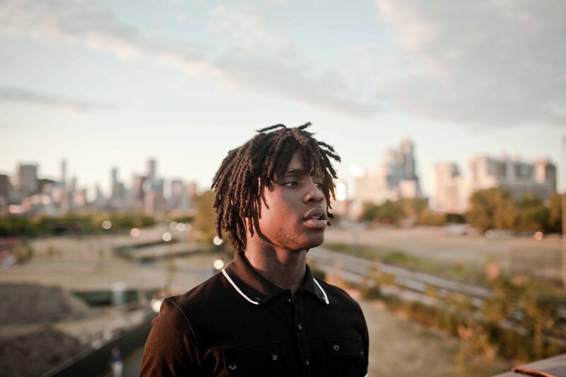 man with dreadlocks in city