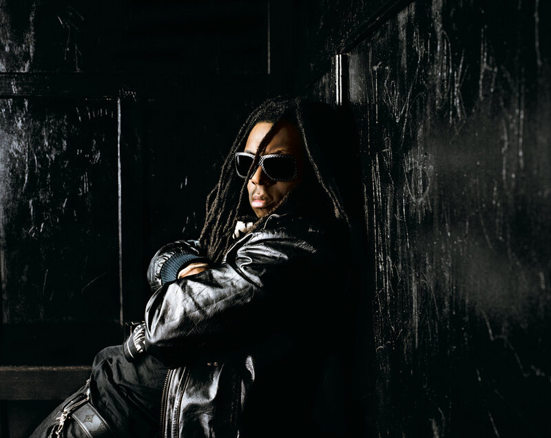 man with dreadlocks in leather jacket