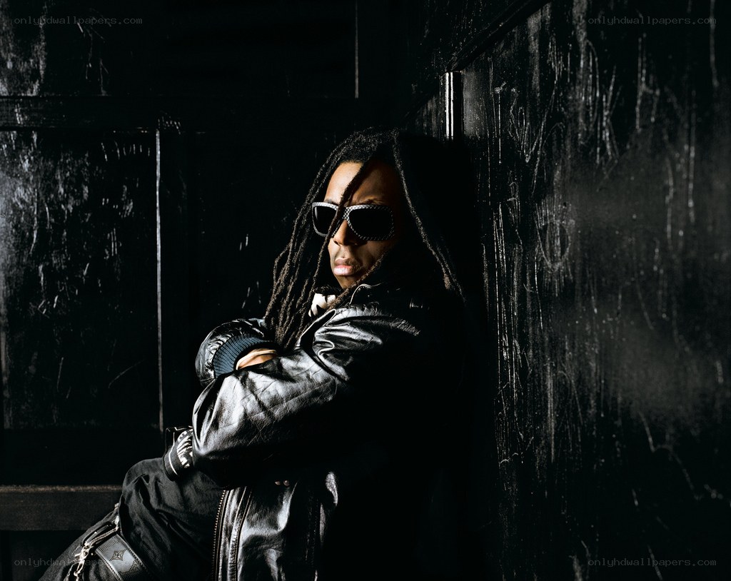 man with dreadlocks in leather jacket