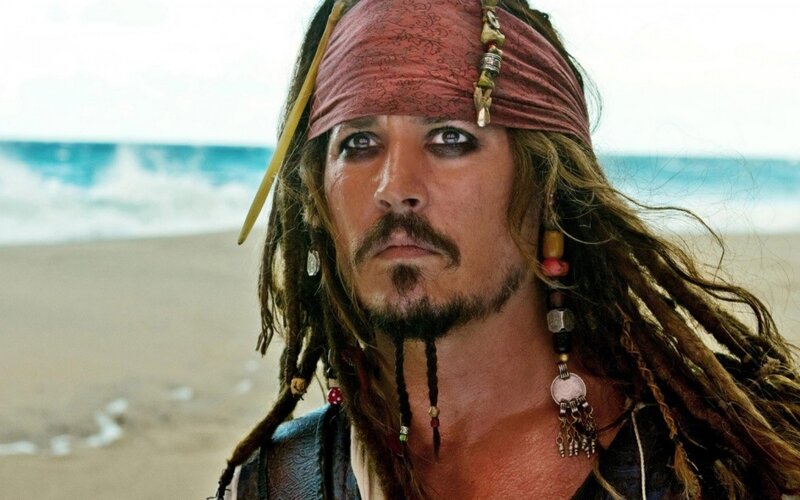 Man with Dreadlocks on Beach — Brown