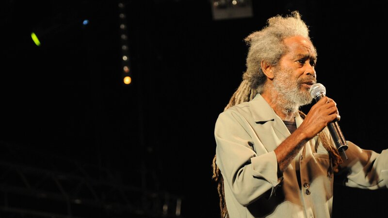 Man with Dreadlocks Singing — Black, Dramatic