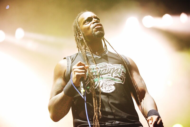 Man with Dreadlocks Singing — Black
