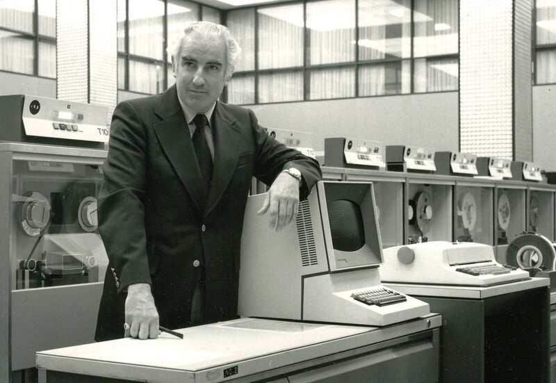 Man with early computer