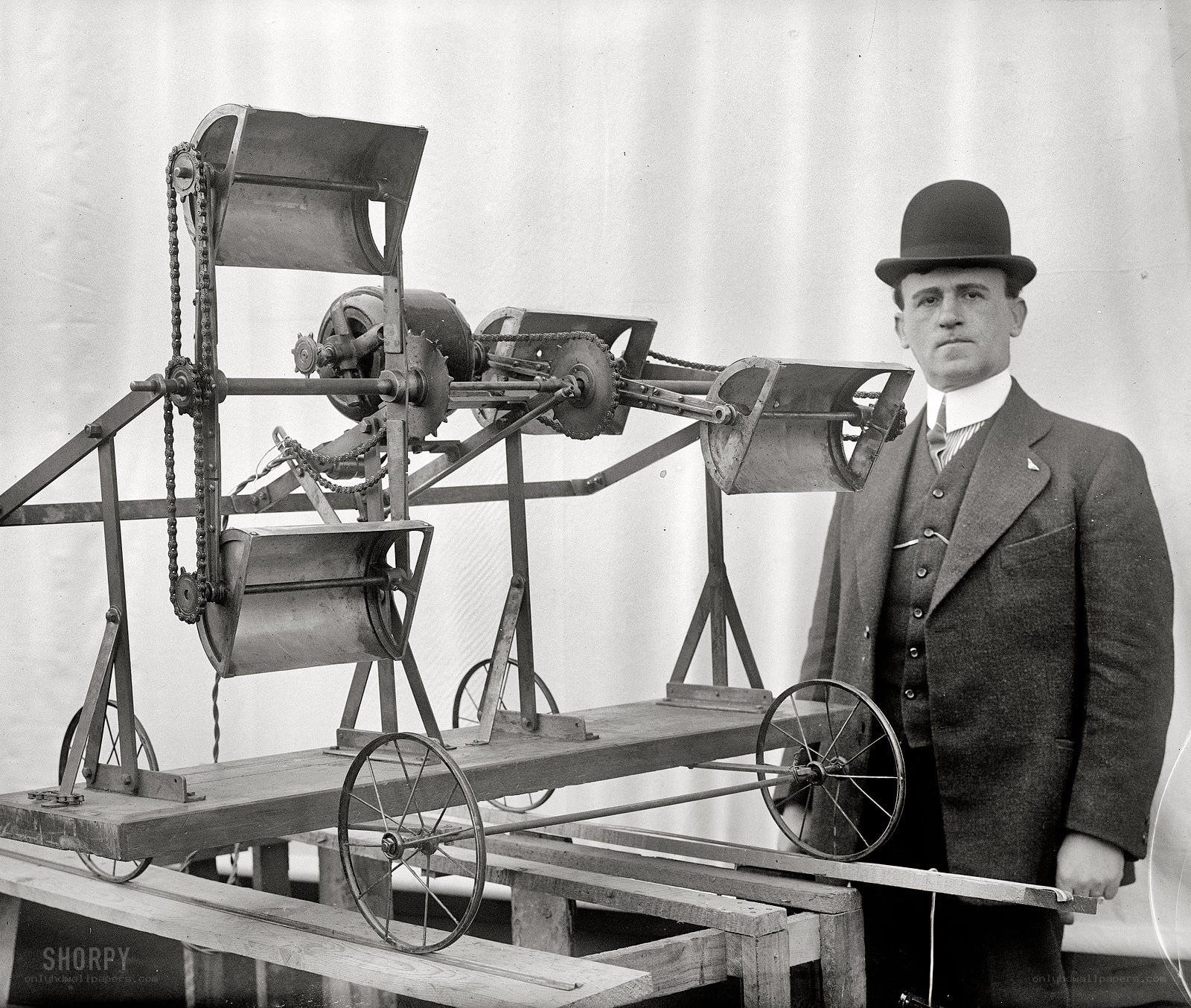 Man with early machine model
