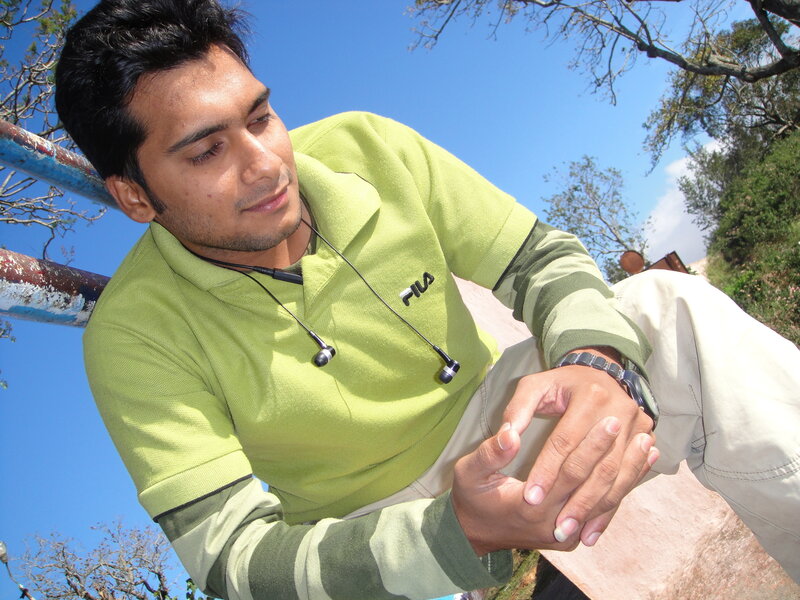 man with earphones outdoors