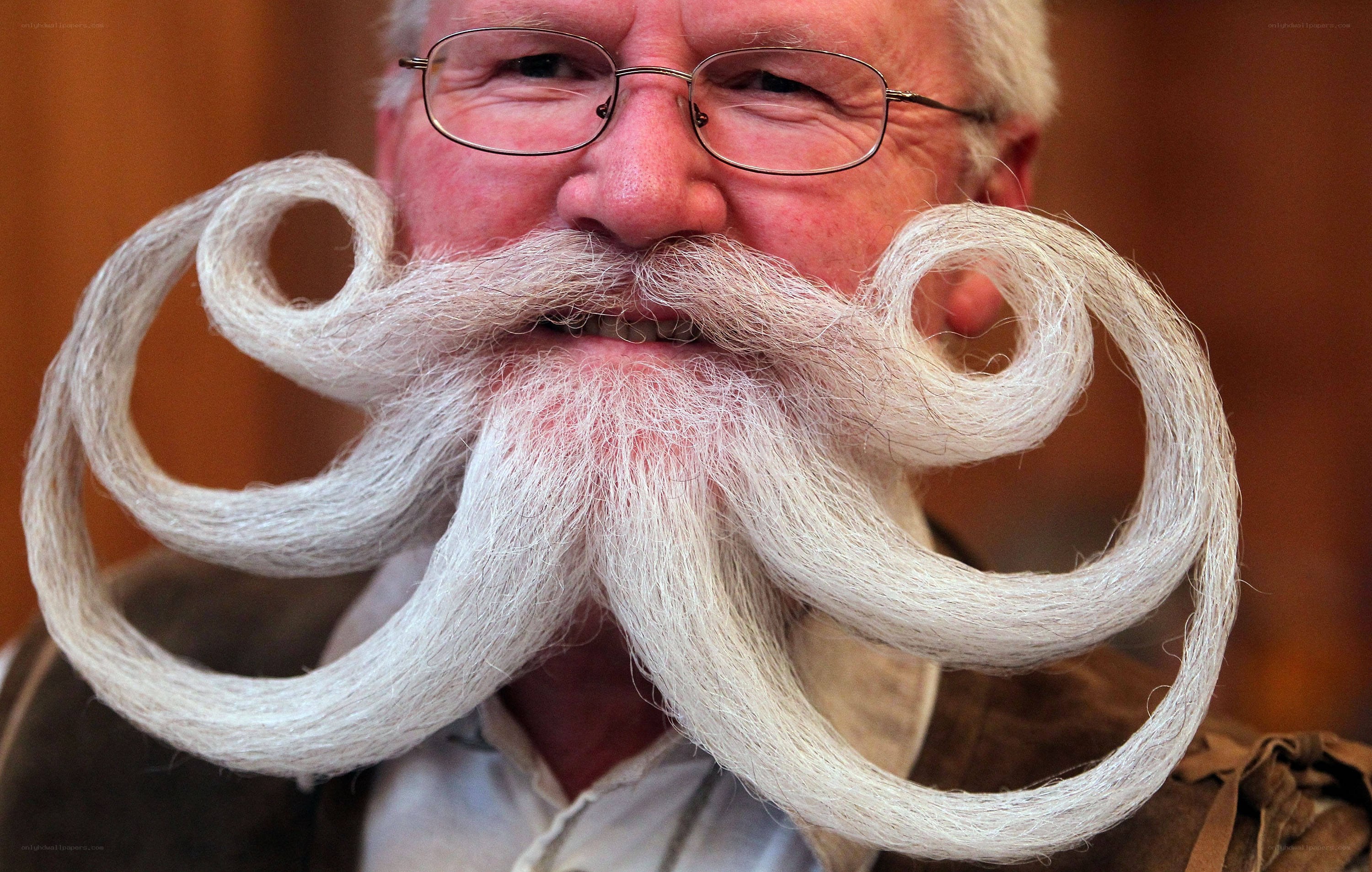 man with elaborate curled mustache