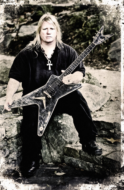 Man with electric guitar
