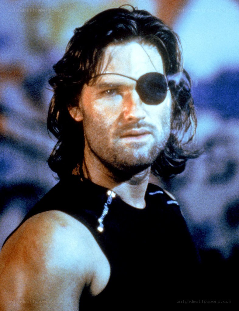 man with eyepatch in black shirt