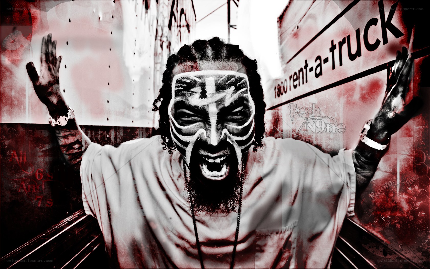 Man with face paint and raised arms