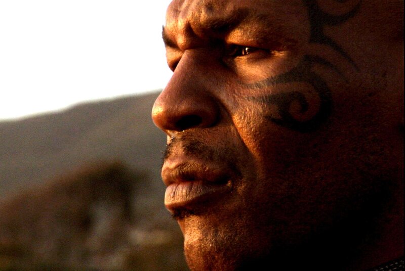 man with face tattoo