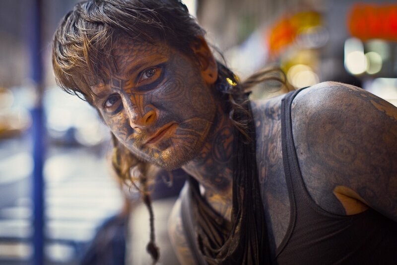 Man with Face Tattoos — Brown