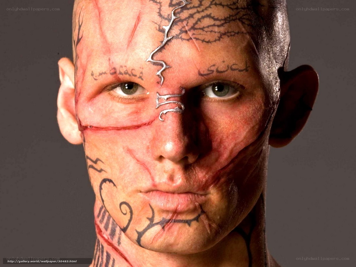 man with face tattoos