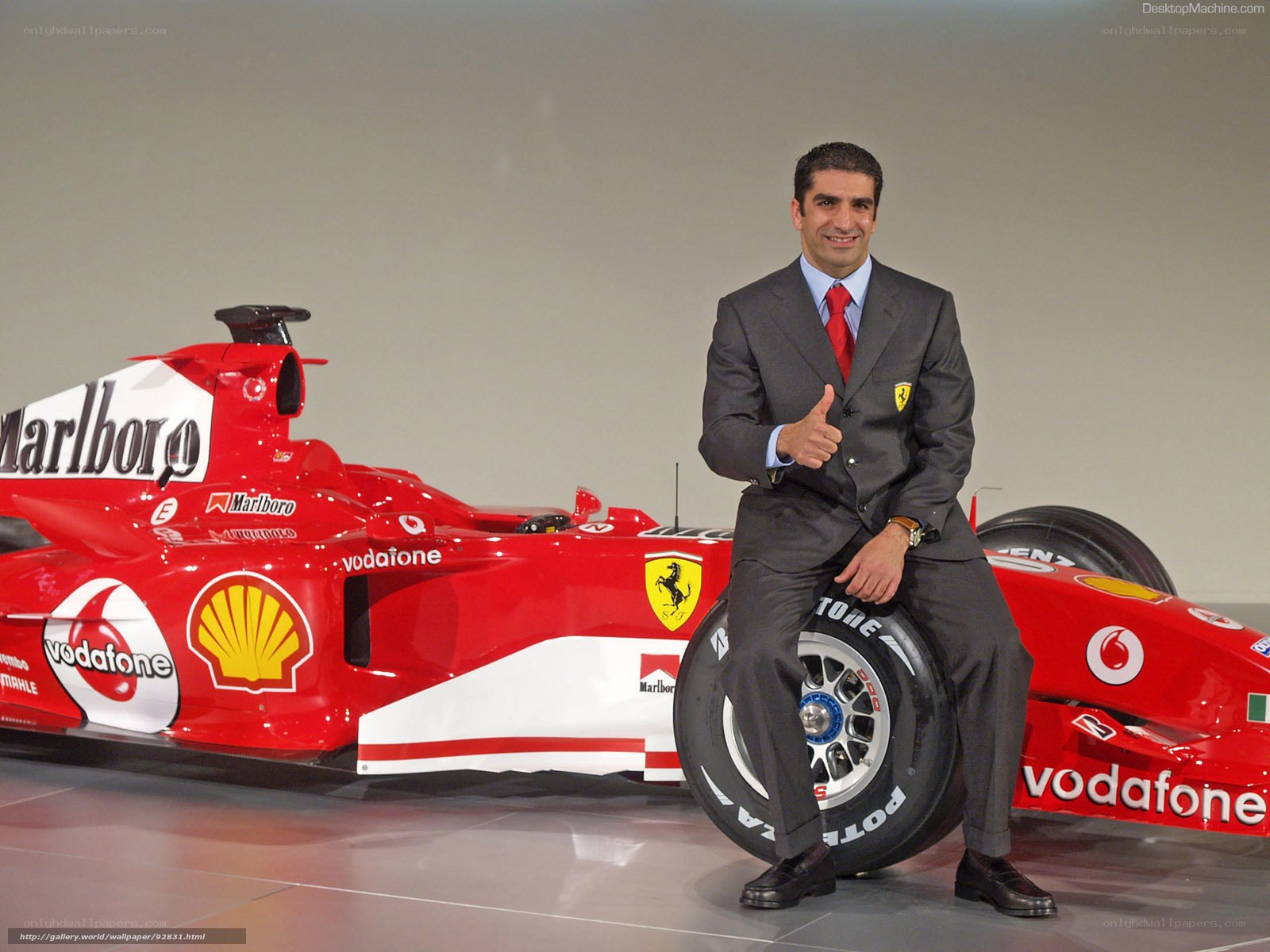 Man with Ferrari race car